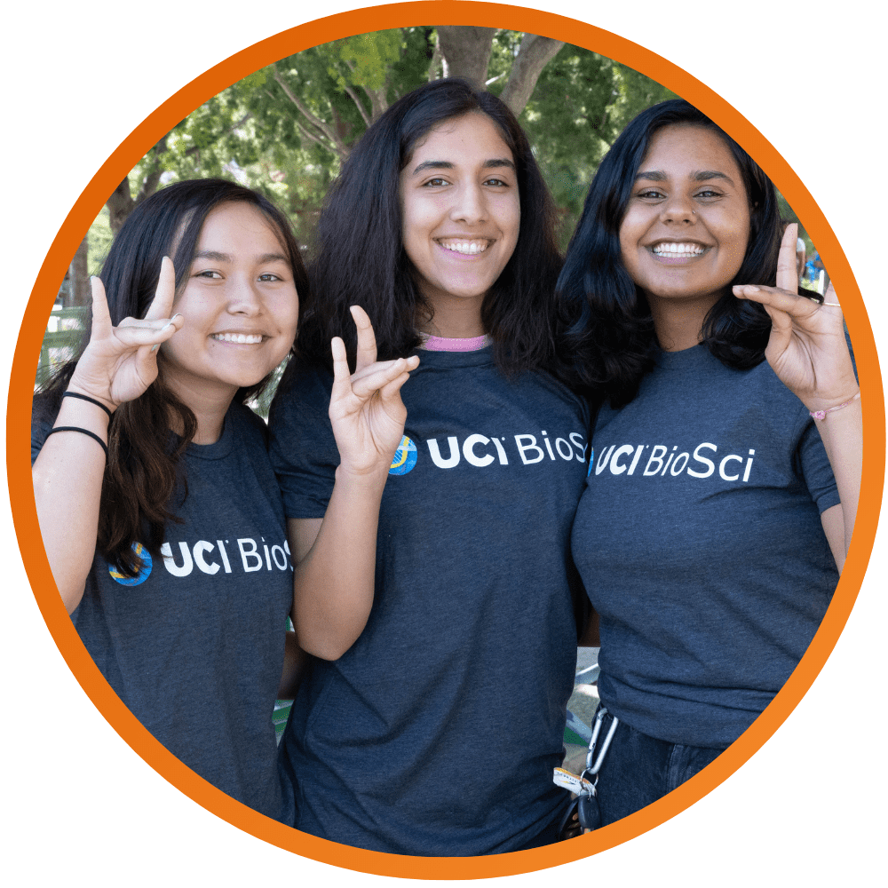 Group picture of three Undergrad bio sci students wearing the UCI BioSci tshirts