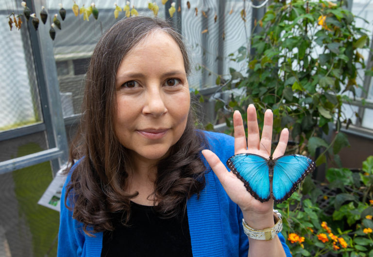 Adriana Briscoe holding butterfly