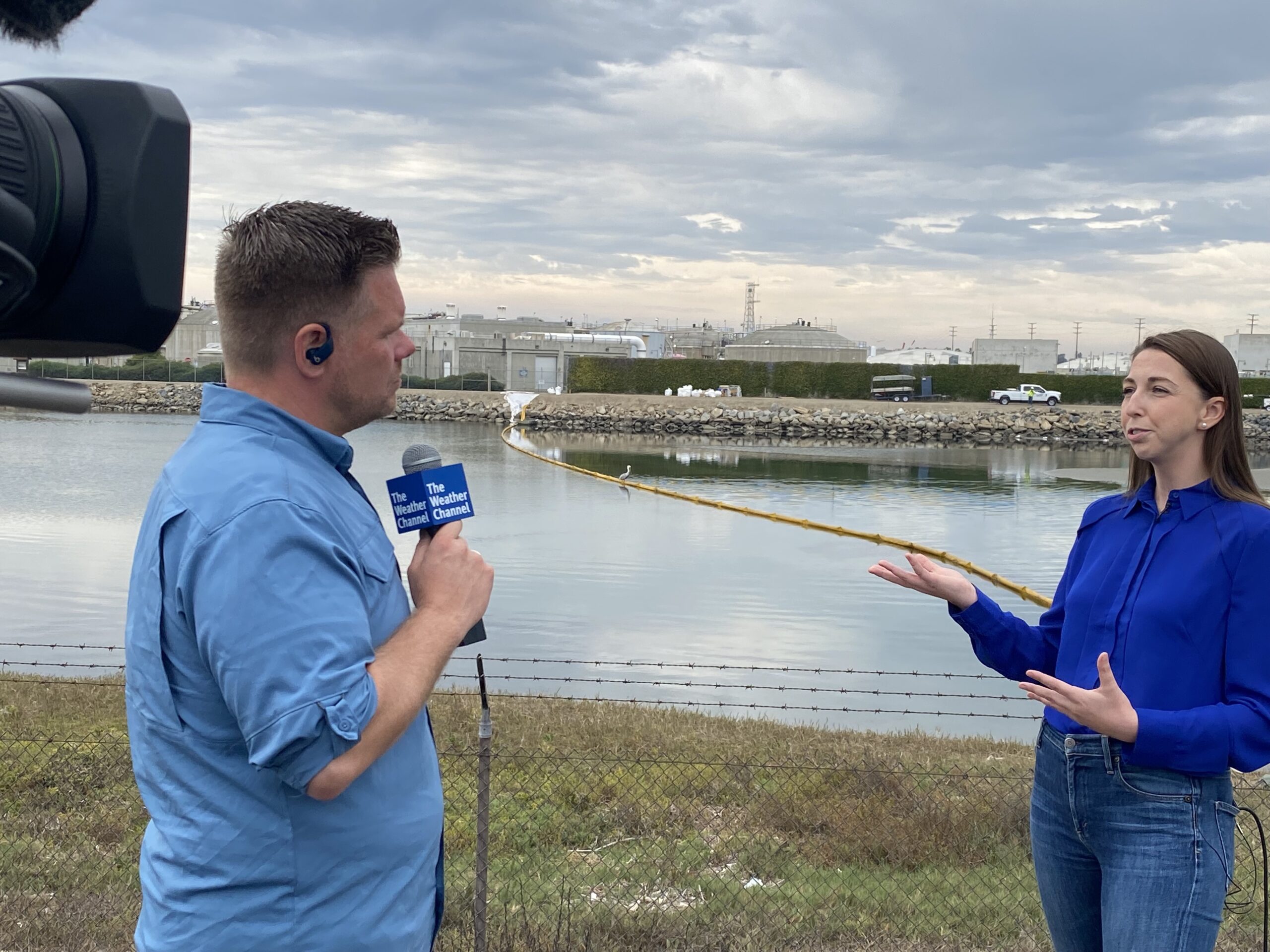 Reporter interviewing Dr. Joleah Lamb for the weather channel.