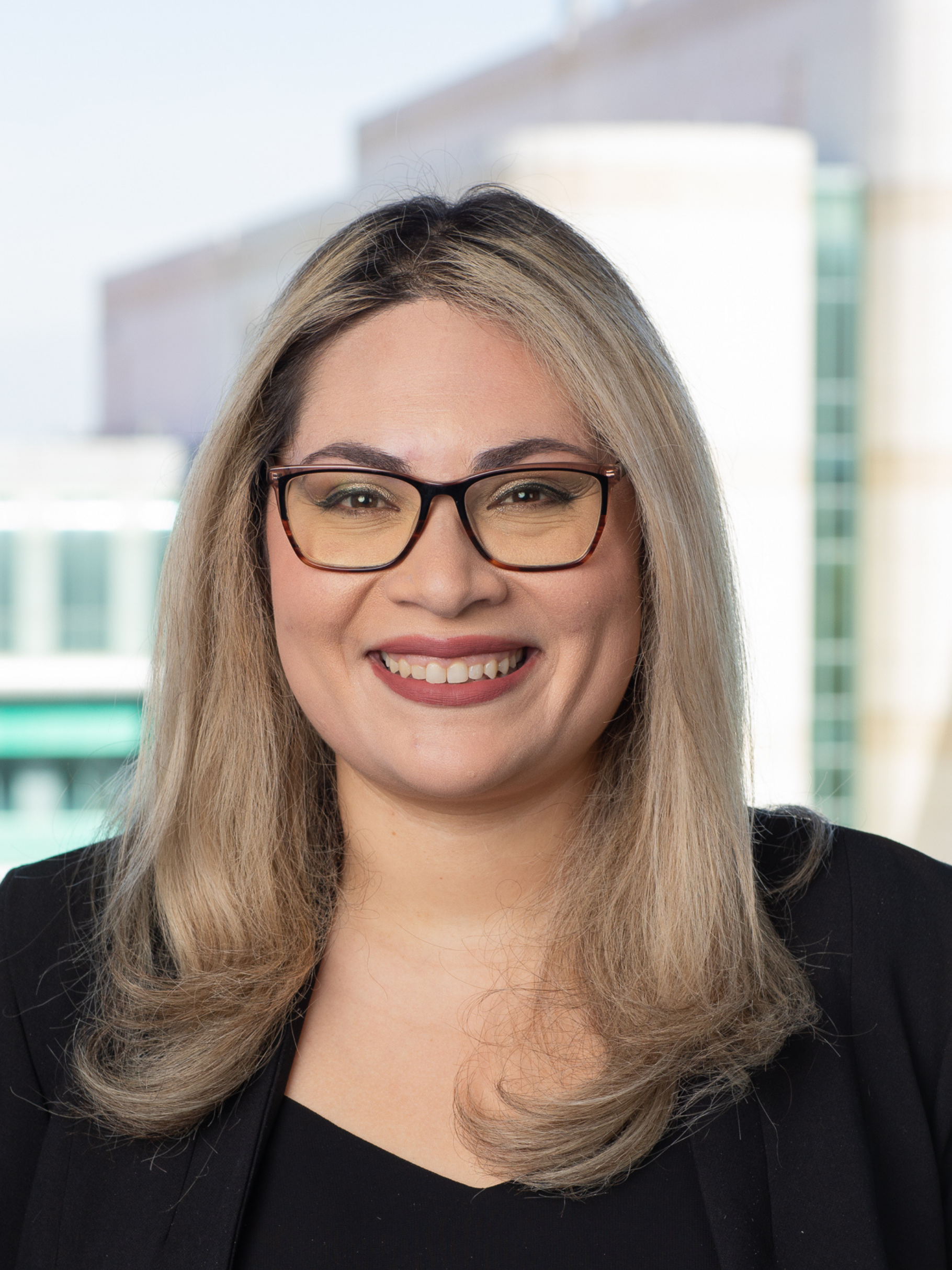 Headshot of Regina Castleman in front of McGaugh Hall.